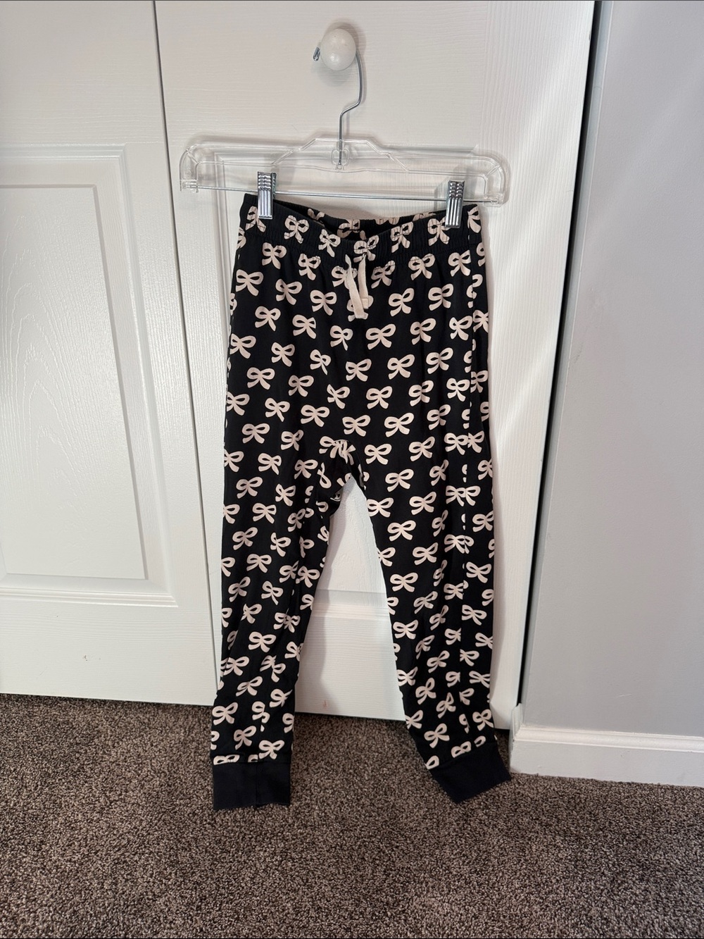 Tea Collection Black Joggers with Cream Bow Print